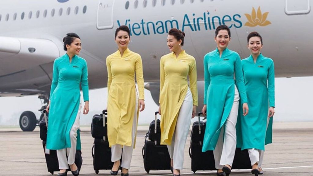 Flight attendants wear Ao Dai as a uniform