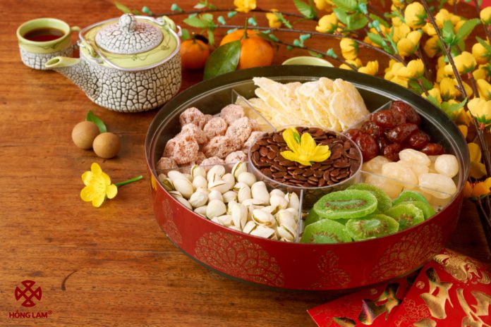 a tray of Tet confectionery and jam, traditional Vietnamese food for Tet